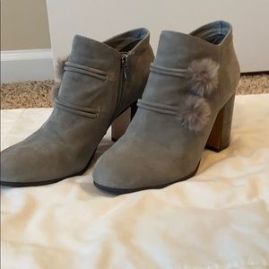 Suede booties with fur Pom poms